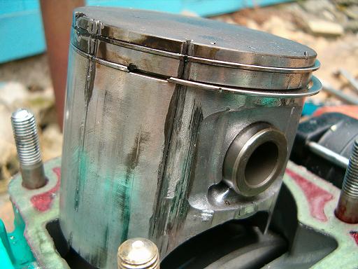 Click image for larger version. 

Name:	Piston after wrist pin fell out - notice the piece at the top.JPG 
Views:	474 
Size:	37.7 KB 
ID:	55